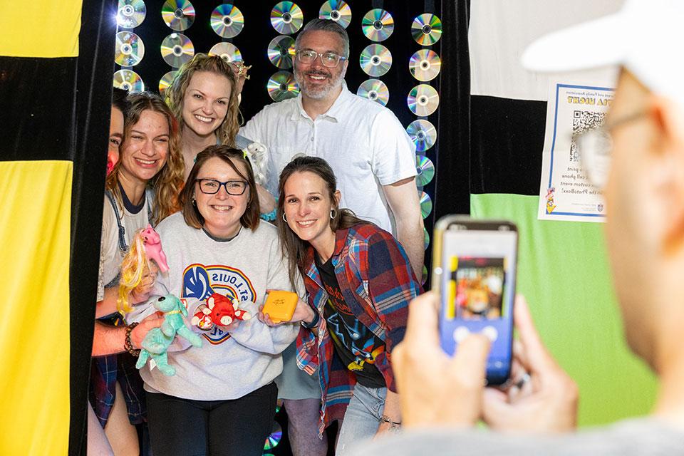 博彩网址大全 staff members posing for a photo at the 2024 BPFA Trivia Night