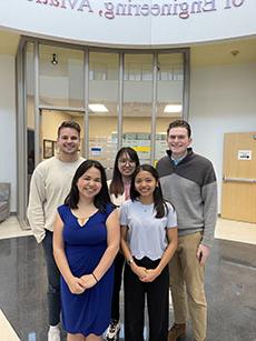 Joseph Capps, Connor Freeman, Andrea Regina Silva, Siyi Wang and Sherry Wisdom posed in McDonnell Douglas Hall